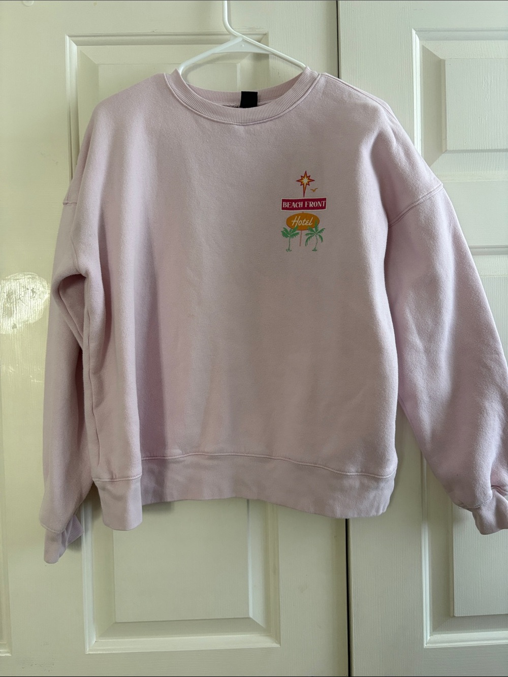 wild fable Pastel Pink Beach Front Hotel Crewneck Sweatshirt